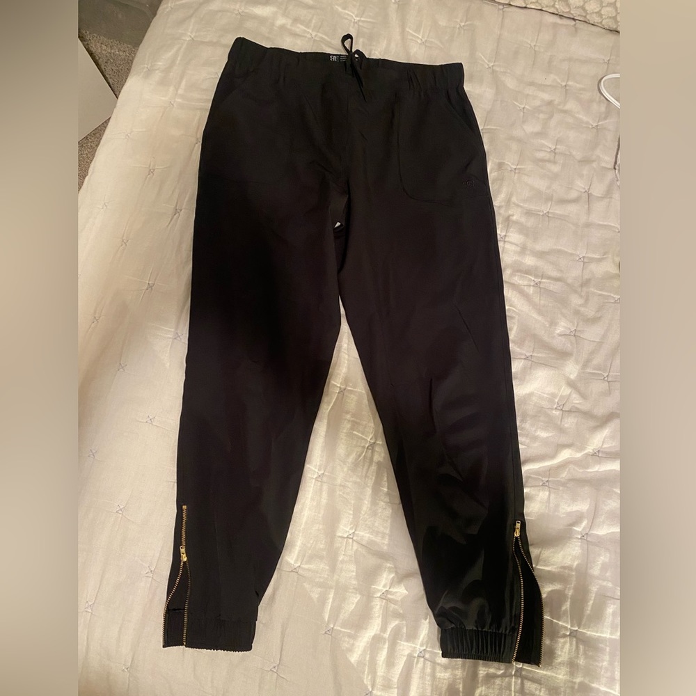 Albion Fit black Jetsetters size small